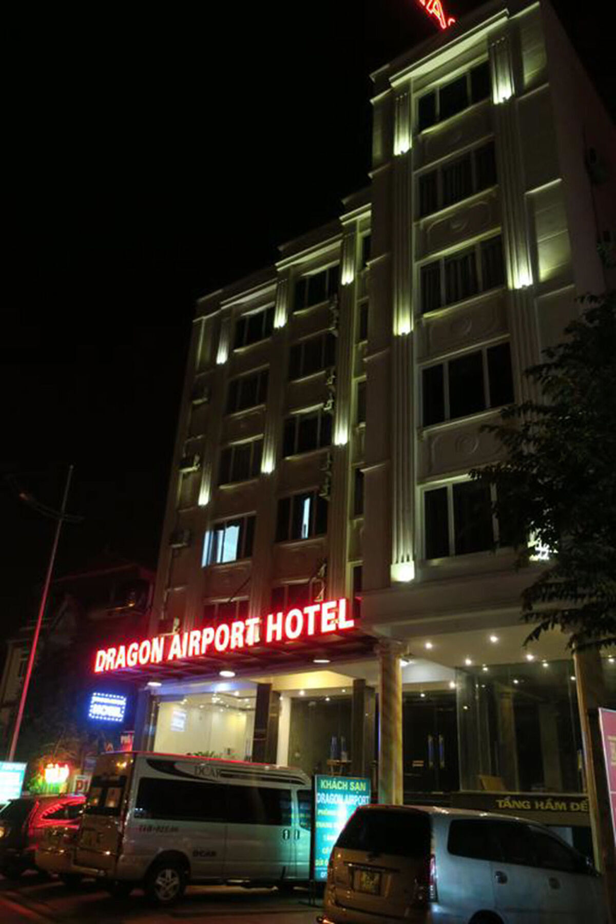 Dragon Airport Hotel Нойбай Экстерьер фото