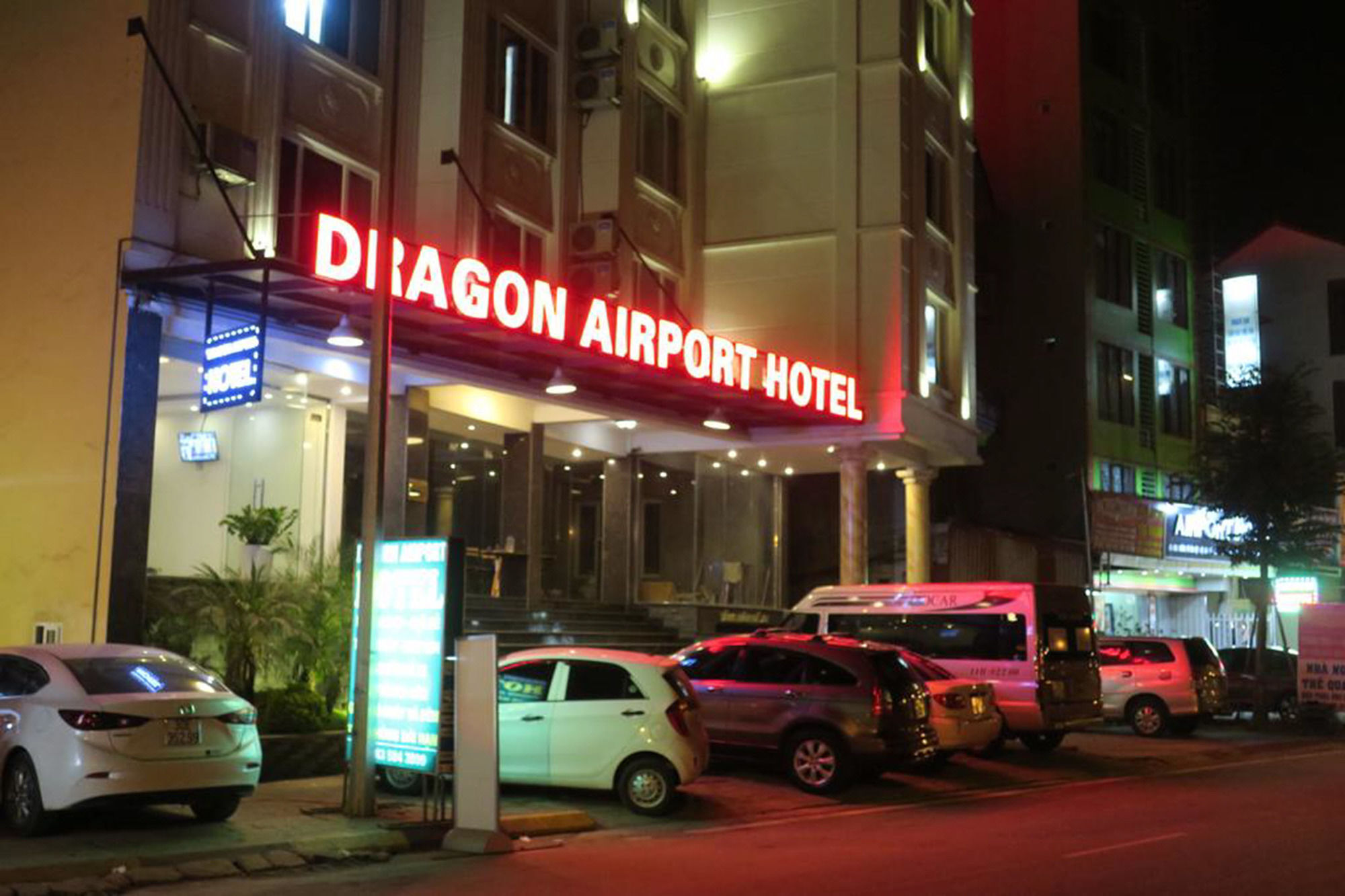 Dragon Airport Hotel Нойбай Экстерьер фото
