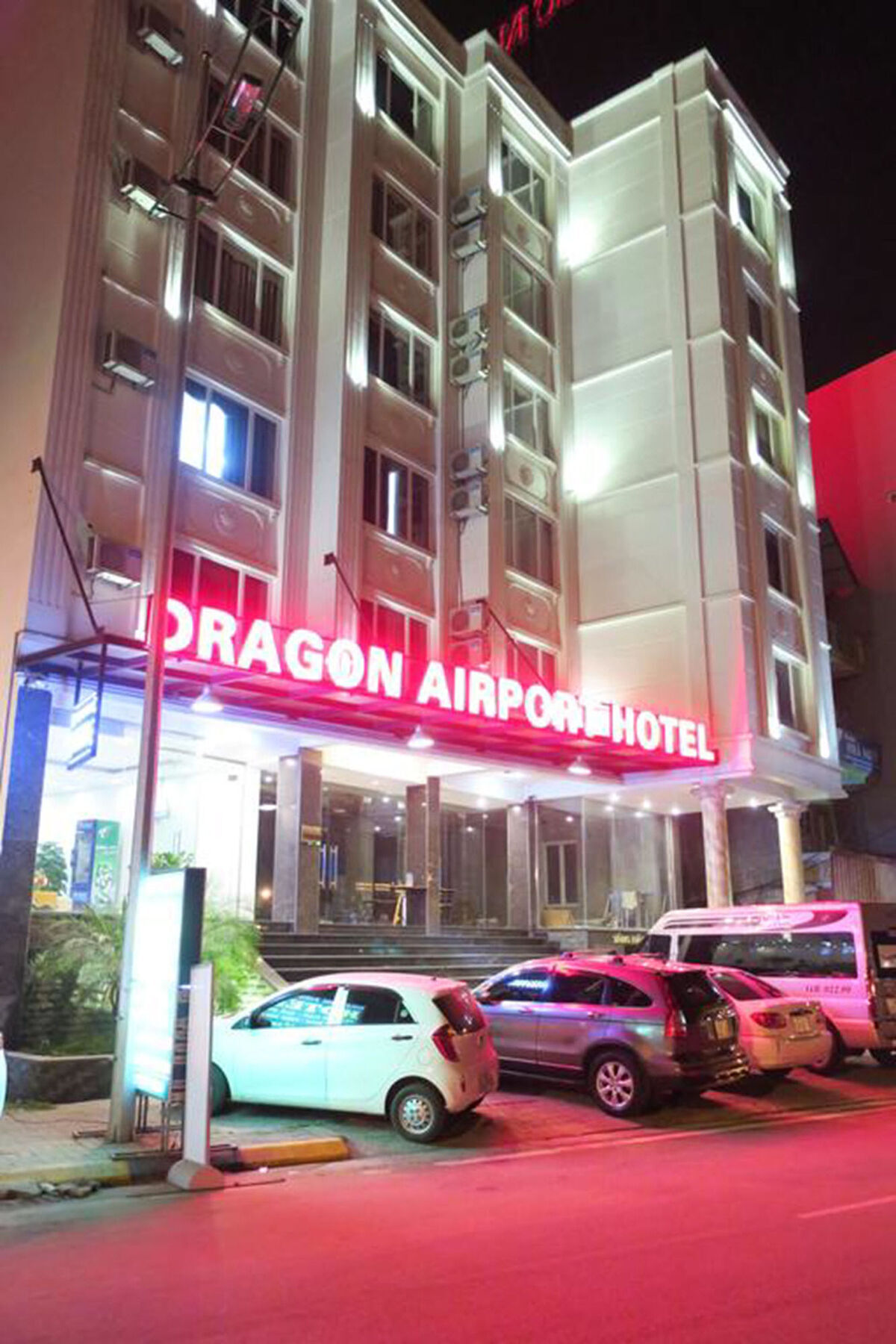Dragon Airport Hotel Нойбай Экстерьер фото