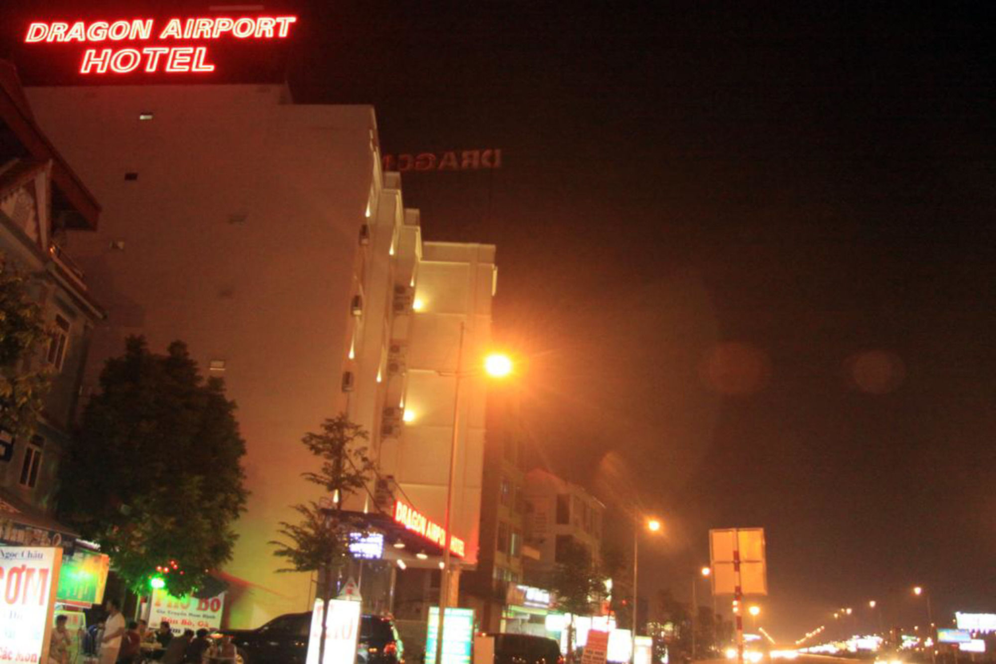 Dragon Airport Hotel Нойбай Экстерьер фото