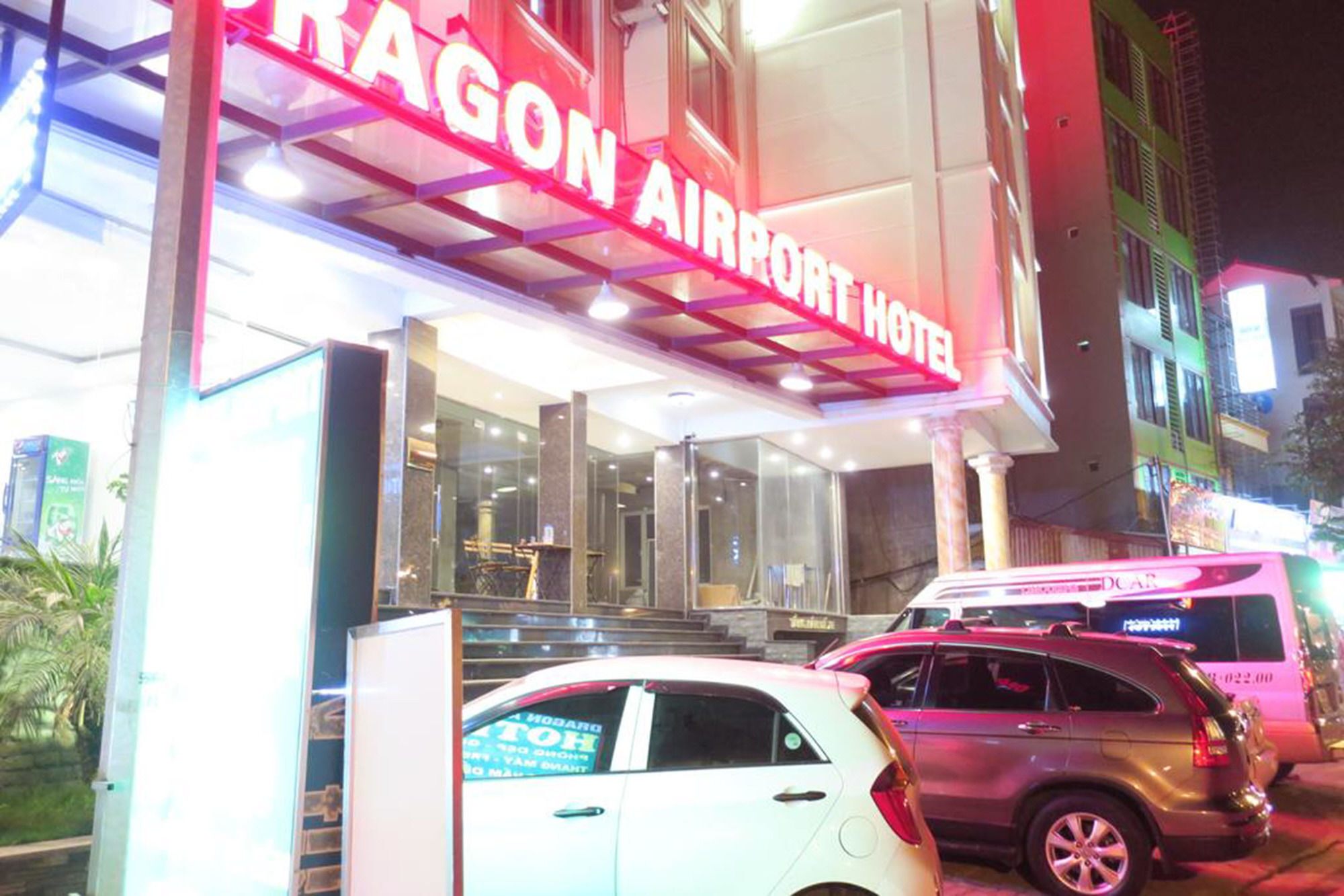 Dragon Airport Hotel Нойбай Экстерьер фото